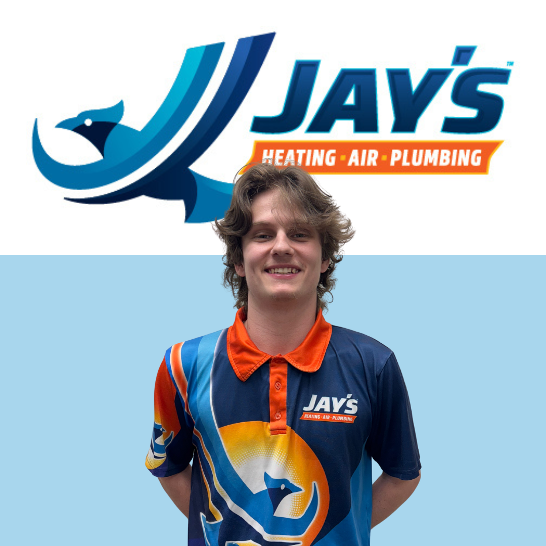 A person wearing a colorful uniform with the "Jay's Heating-Air-Plumbing" logo, standing proudly in front of a backdrop featuring the same logo, represents their team of 5-Star Technicians.